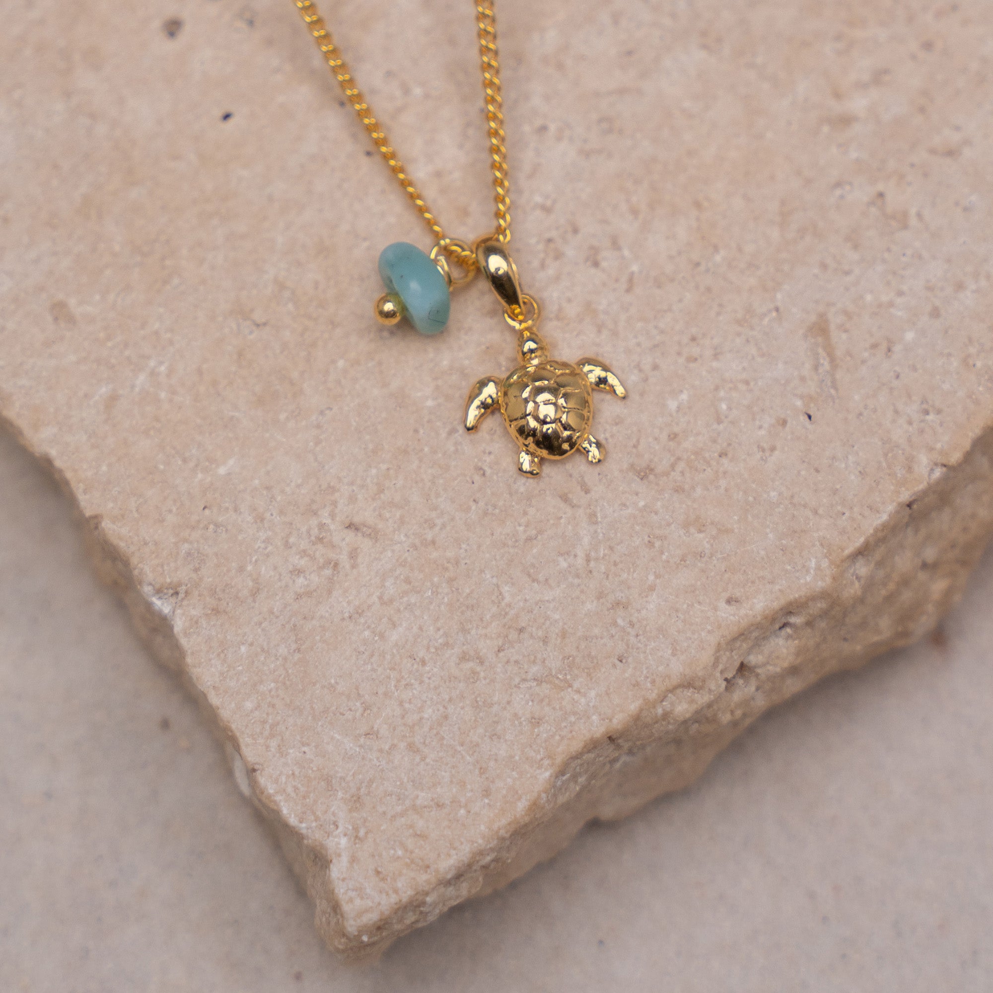 Gold sea shop turtle necklace